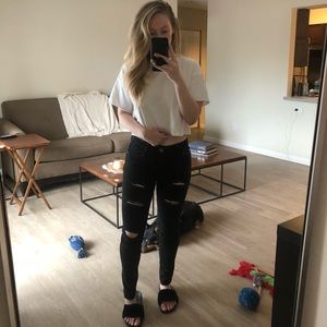 Mid Rise Black Jeans With Rips